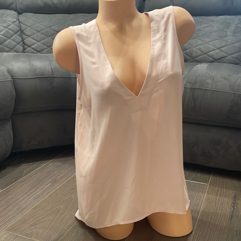 Express blush polyester tank top. Gently worn. Sz med. no damage